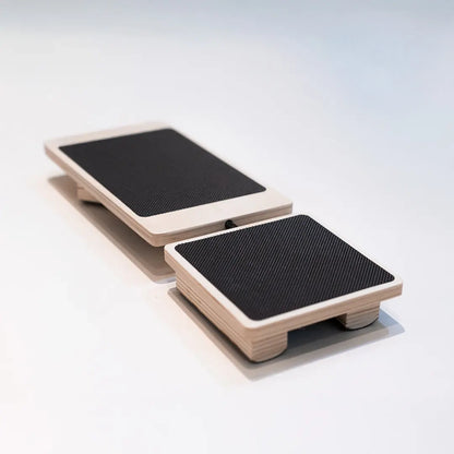 Two rectangular blackboards with light wooden frames, different sizes, angled surfaces.